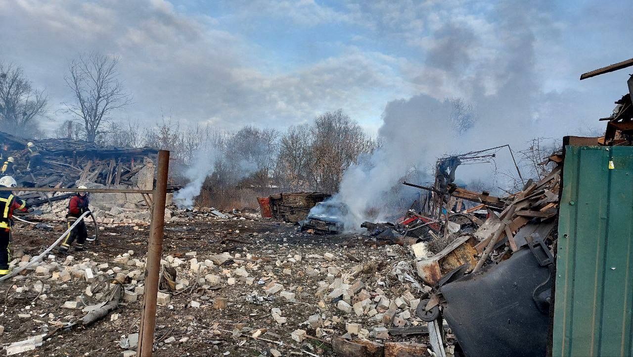 Rescuers work at houses heavily damaged by a Russian missile strike in Kyiv,?Ukraine, on?December 29.