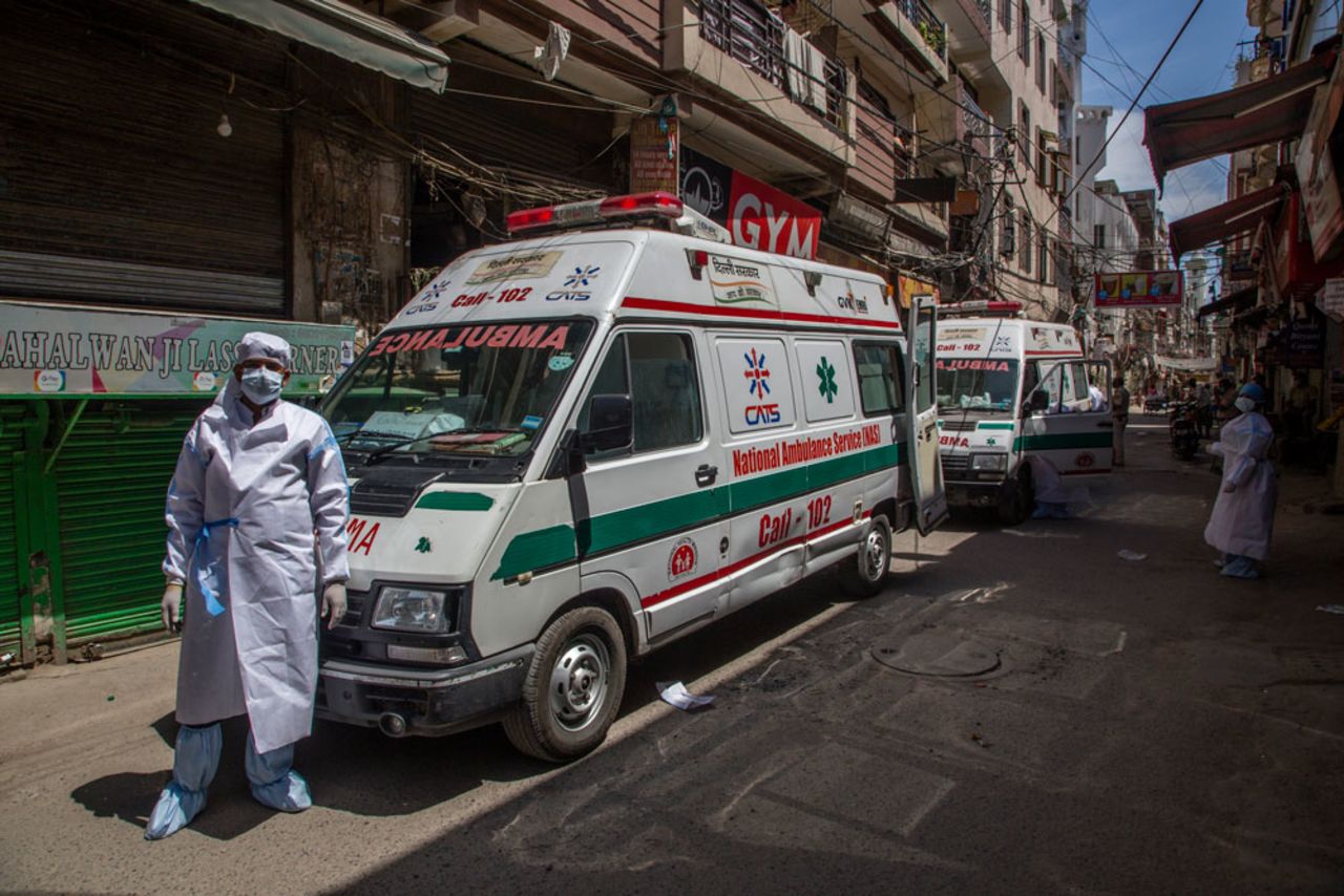 Ambulances wait to take people to a quarantine facility in New Delhi, India, on April 3.