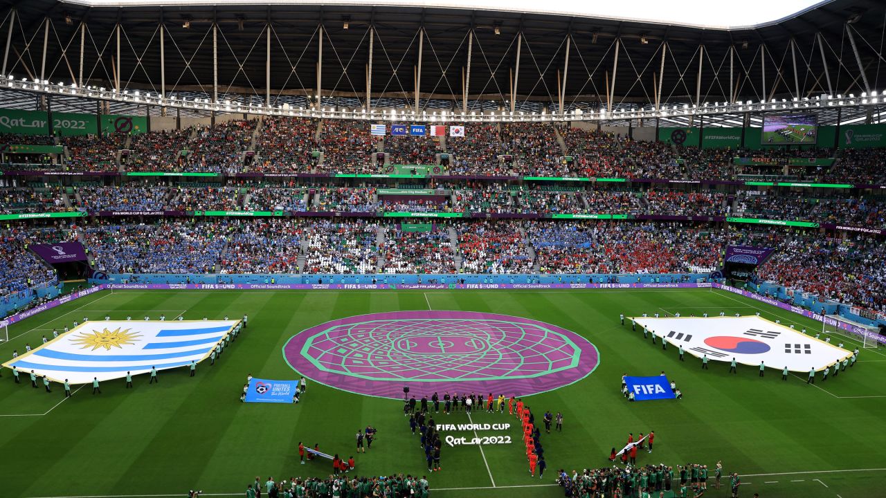 Players from South Korea and Uruguay walk onto the pitch before Thursday's match at Education City Stadium in Al Rayyan, Qatar.