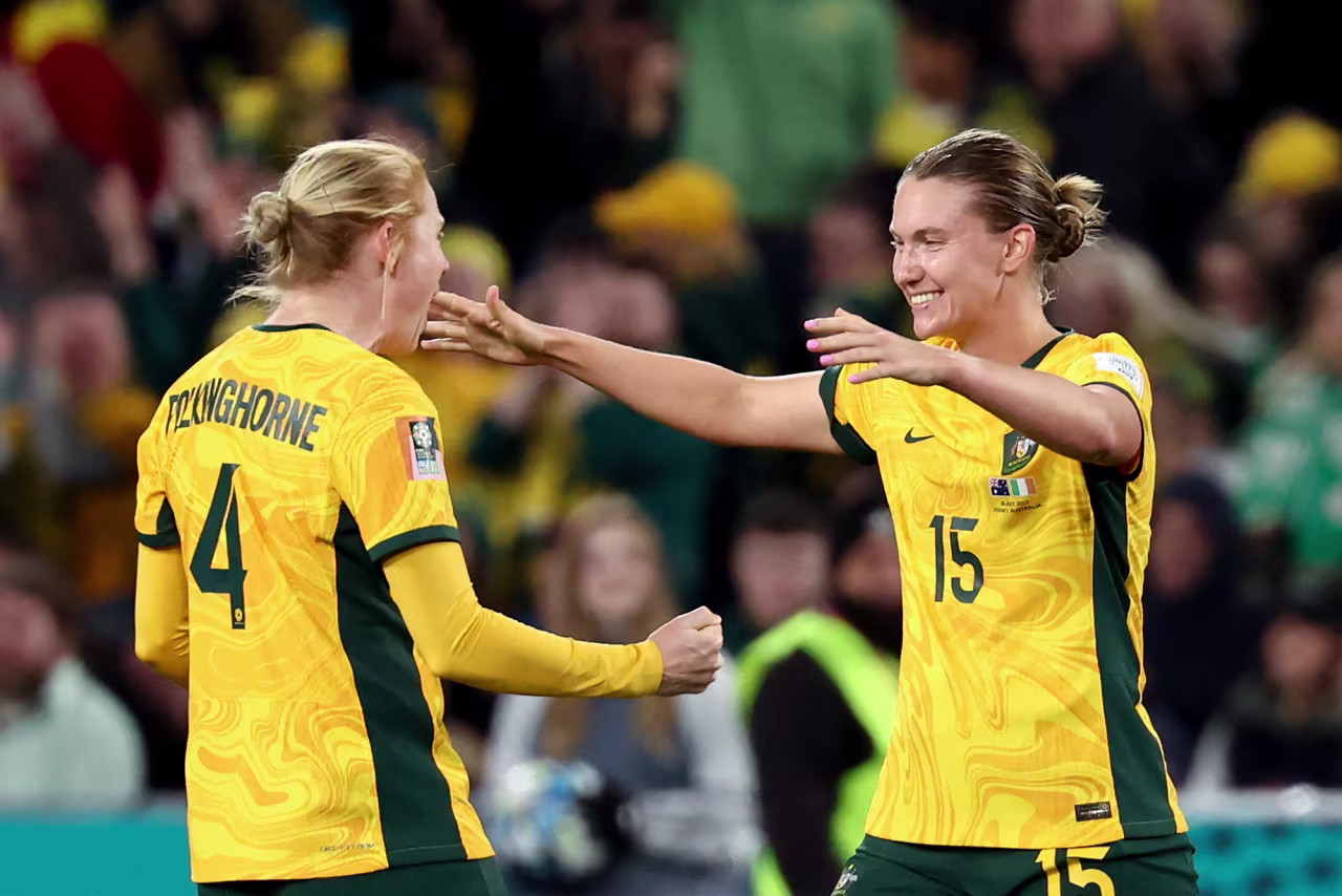 Australia's Clare Polkinghorne and Clare Hunt celebrate after winning the match against Ireland on July 20. 