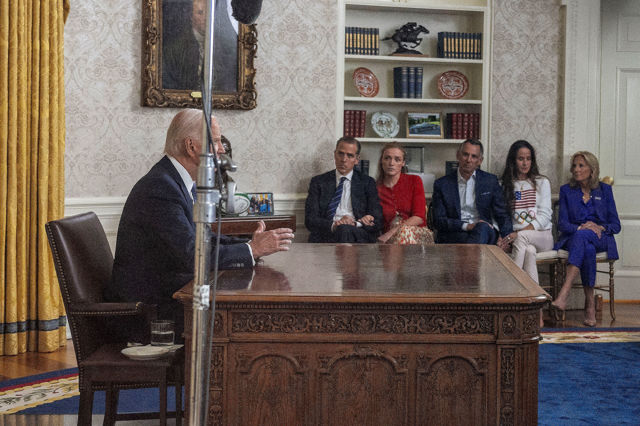 President Joe Biden speaks during an address to the nation about his decision to not seek reelection as his son Hunter Biden, Ashley Biden's husband Howard Krein, Biden's daughter Ashley Biden and US First Lady Jill Biden listen, in the Oval Office at the White House in Washington, DC, on July 24. 