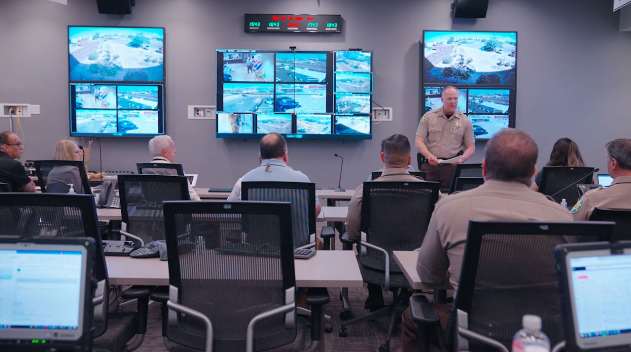 Maricopa County Sheriff's Office deputies monitor for any security threats from their emergency operations center during Arizona's July 30 primary election.