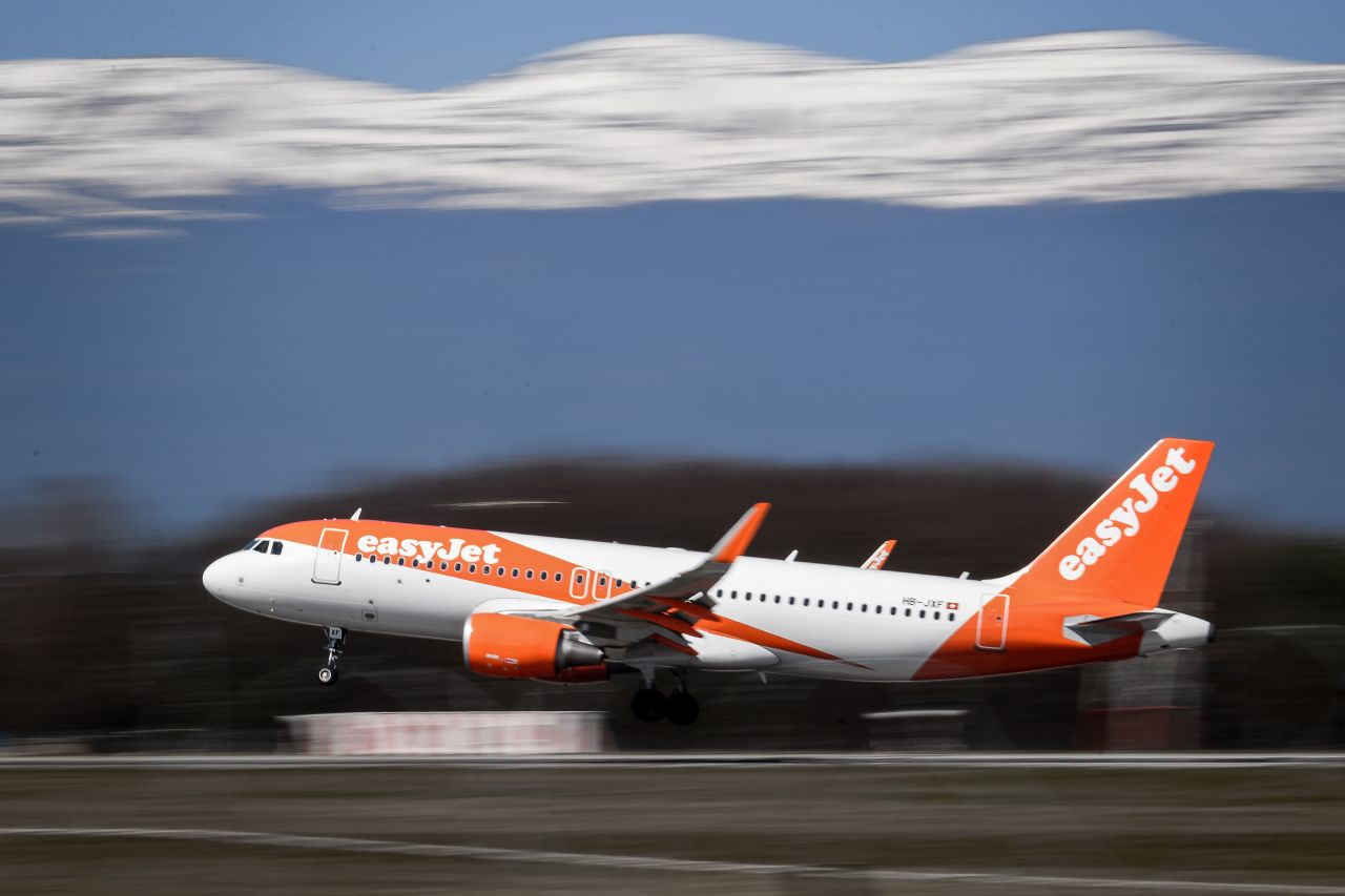 An EasyJet Airbus A320 commercial plane with registration HB-JXF landing at Geneva Airport on March 22.