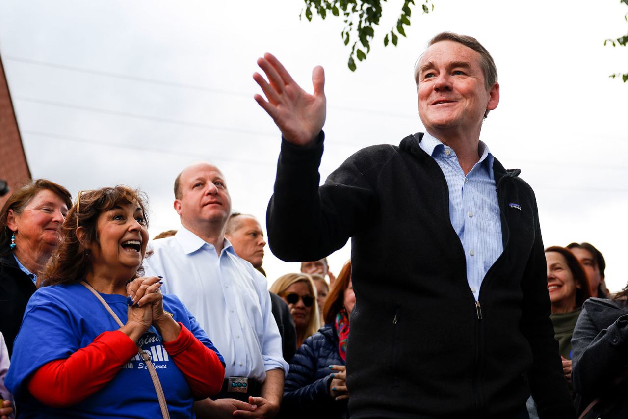 Sen. Michael Bennet speaks to supporters at a rally outside Mountain Toad Brewing on October 26 in Golden, Colorado.