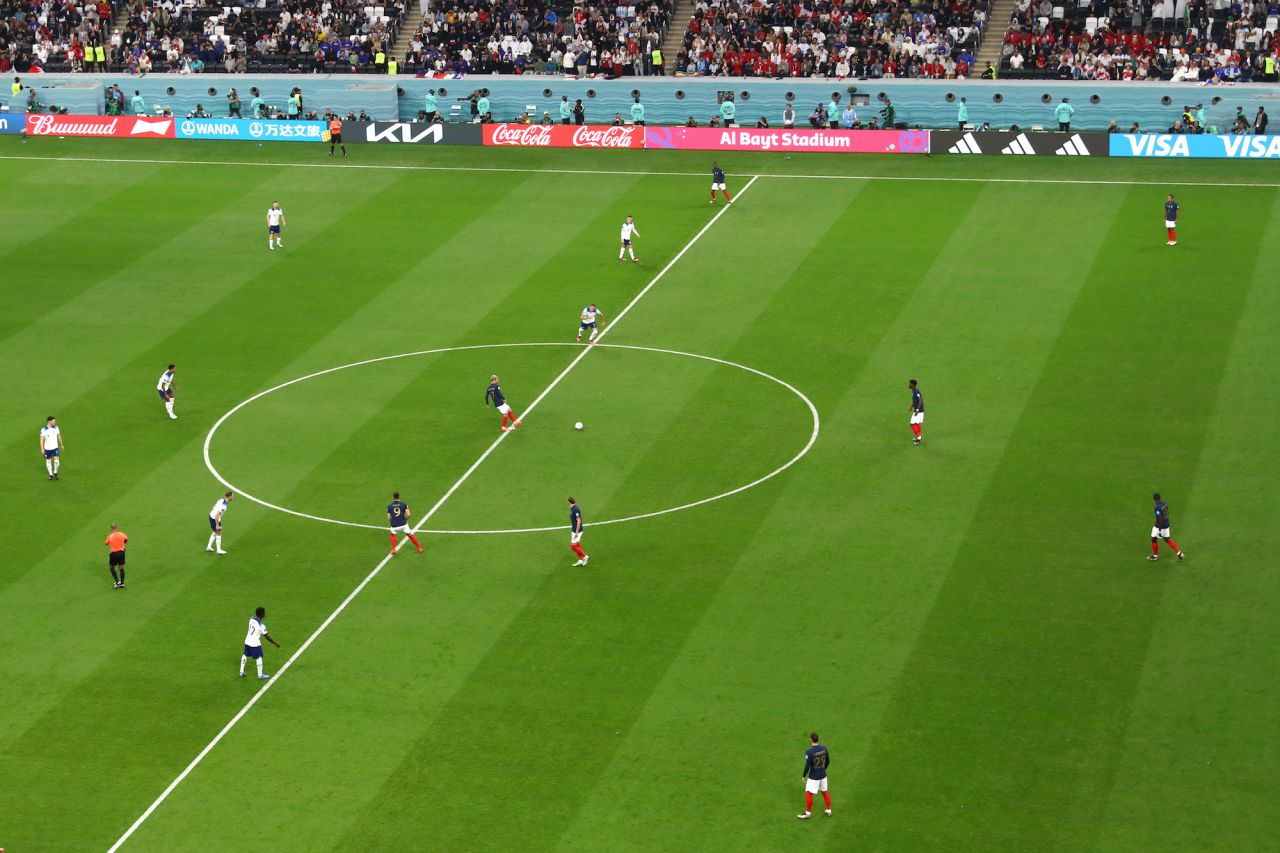 Antoine Griezmann of France kicks off during the quarter final match between England and France at Al Bayt Stadium.
