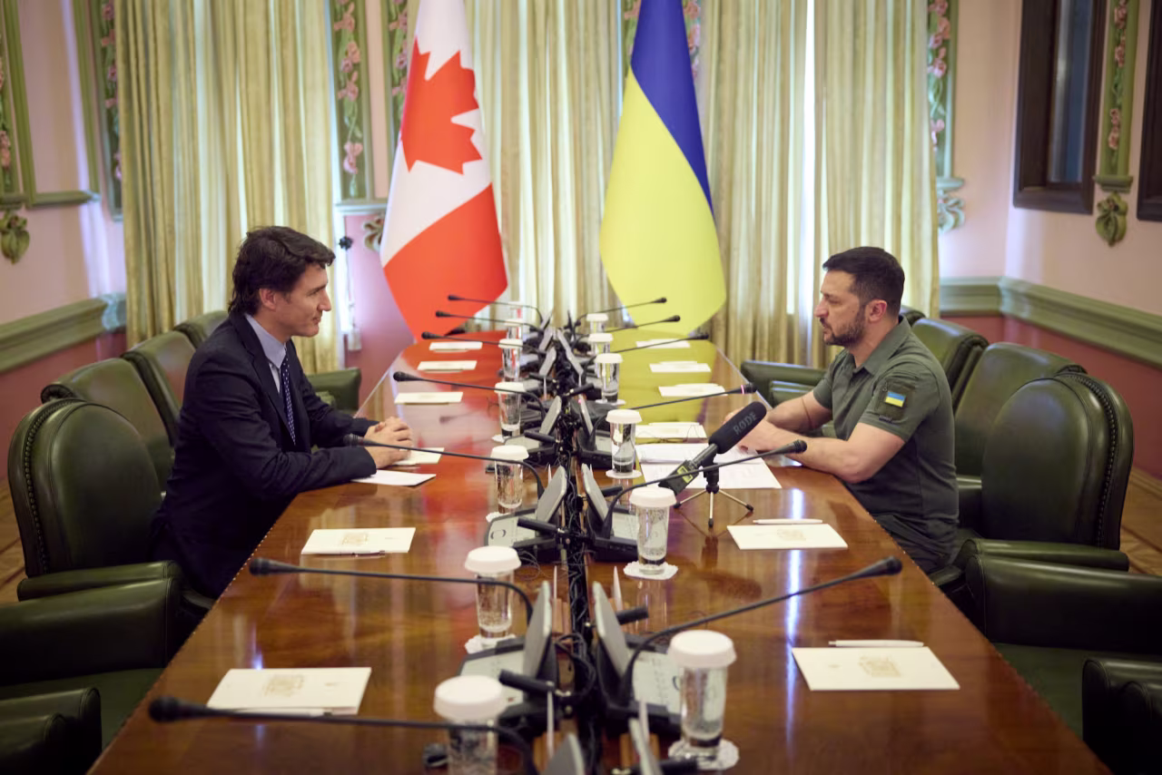 Zelensky and Trudeau attend a in Kyiv on Saturday.