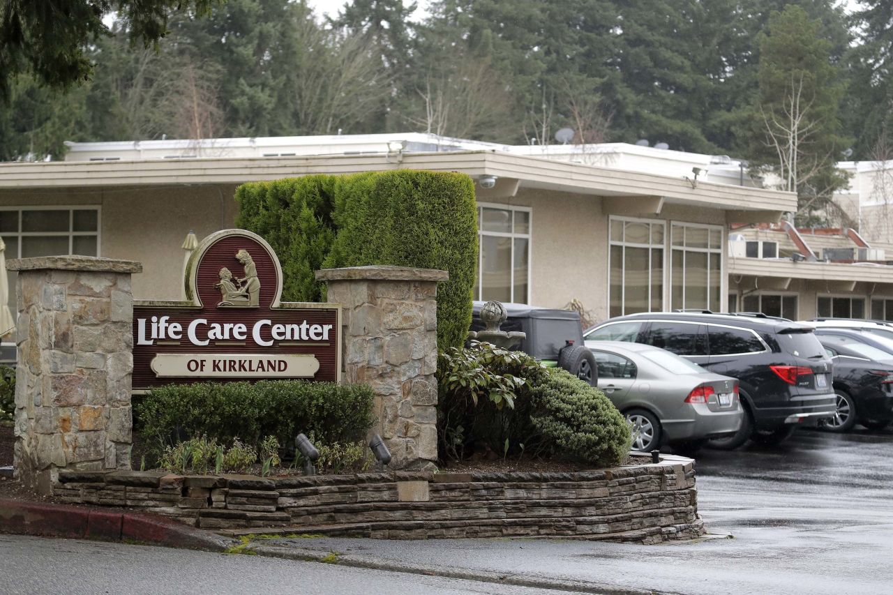 A sign is pictured at the entrance of the Life Care Center in Kirkland, Washington, a facility linked with confirmed coronavirus cases.