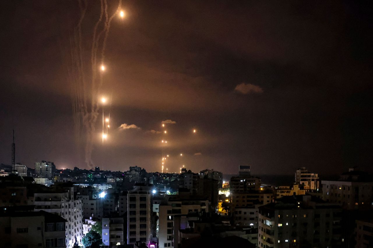 Rockets fired from Gaza City, are intercepted by the Israeli Iron Dome defence missile system on October 7.