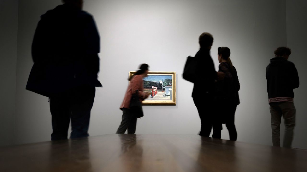 Visitors look at a painting after the reopening of the Beyeler Foundation in Riehen, Switzerland, on May 15.