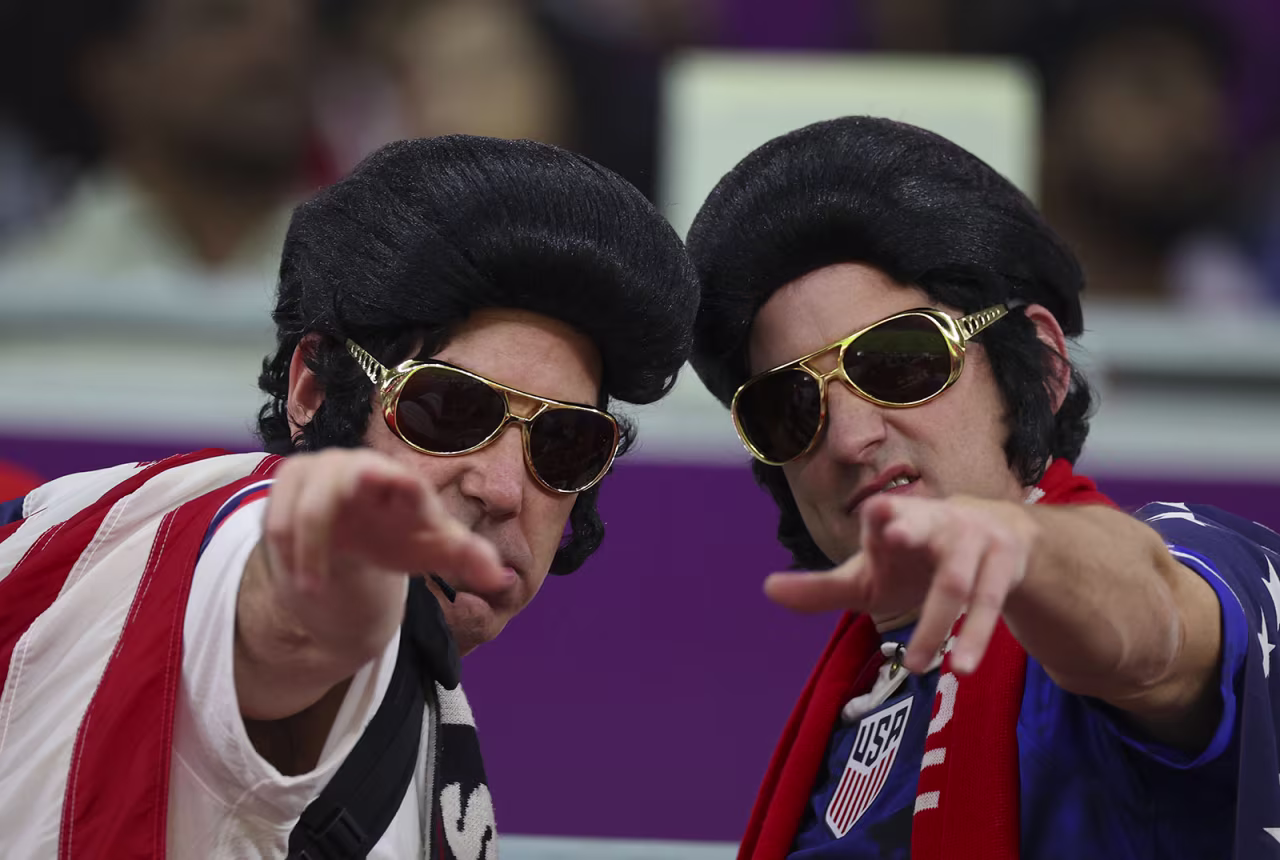 Two Elvis-themed fans are seen prior to the match between USA and Wales on November 21.