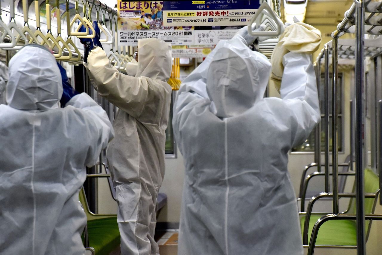 Kyoto city workers sanitize trains on March 4.