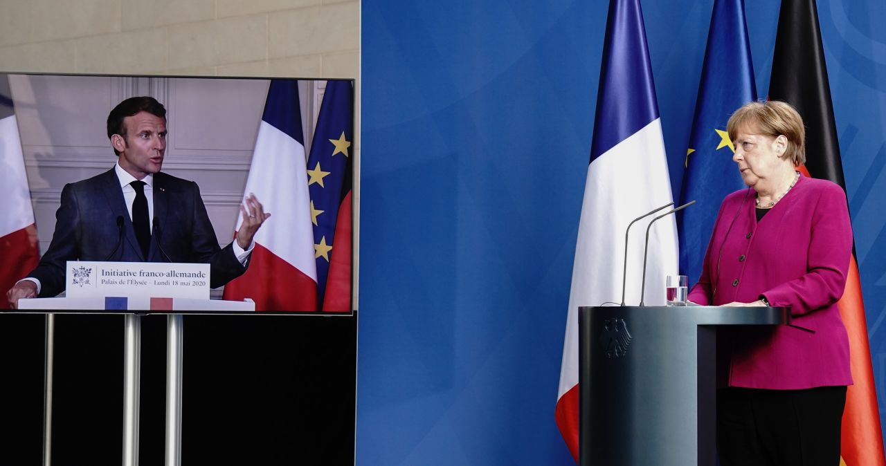 German Chancellor Angela Merkel listens during a joint press conference on the COVID-19 pandemic with French President Emmanuel Macron, who attends via video link, in Berlin, Germany, on Monday, May 18.  