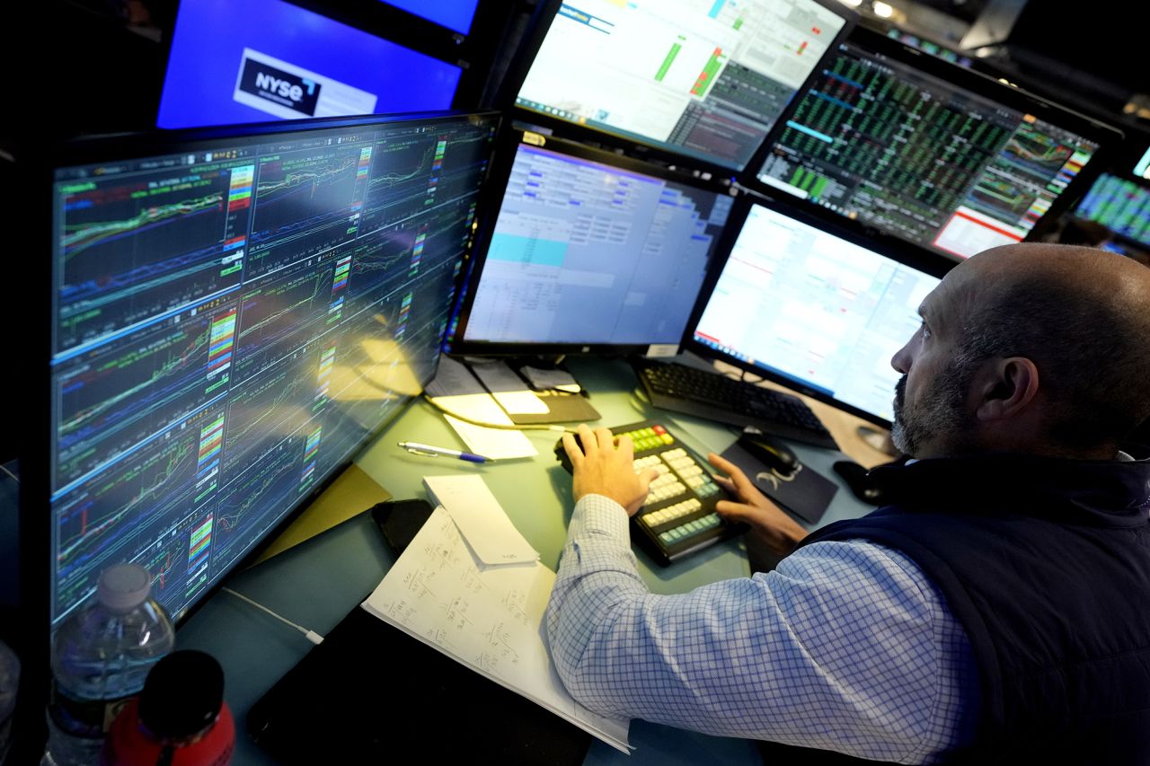 Specialist James Denaro works at his post on the floor of the New York Stock Exchange on June 12.