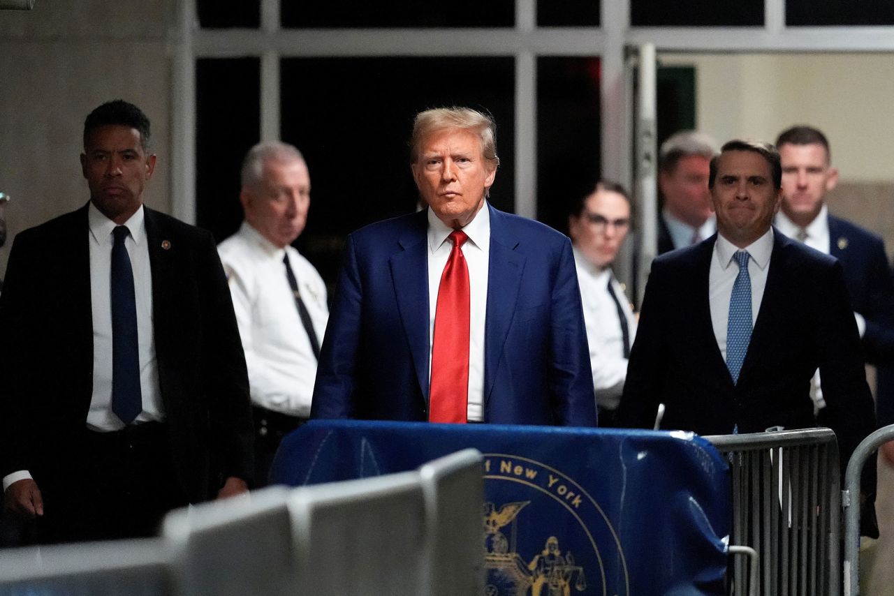 Former President Donald Trump returns after a break in a pre-trial hearing at a courthouse in New York on Monday, March 25.