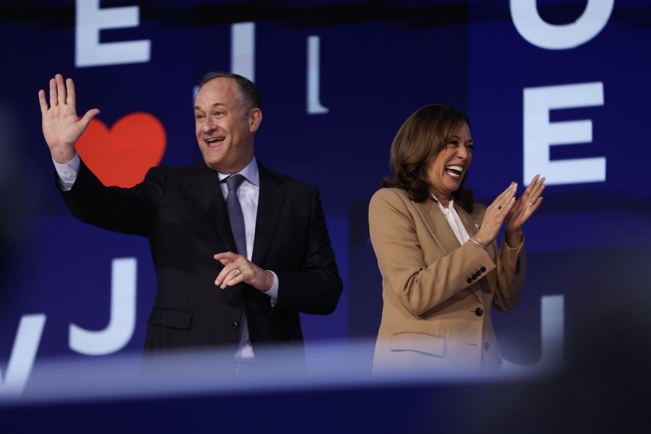 Second Gentleman Doug Emhoff and Vice President Kamala Harris are onstage during the first day of the Democratic National Convention on August 19, in Chicago.