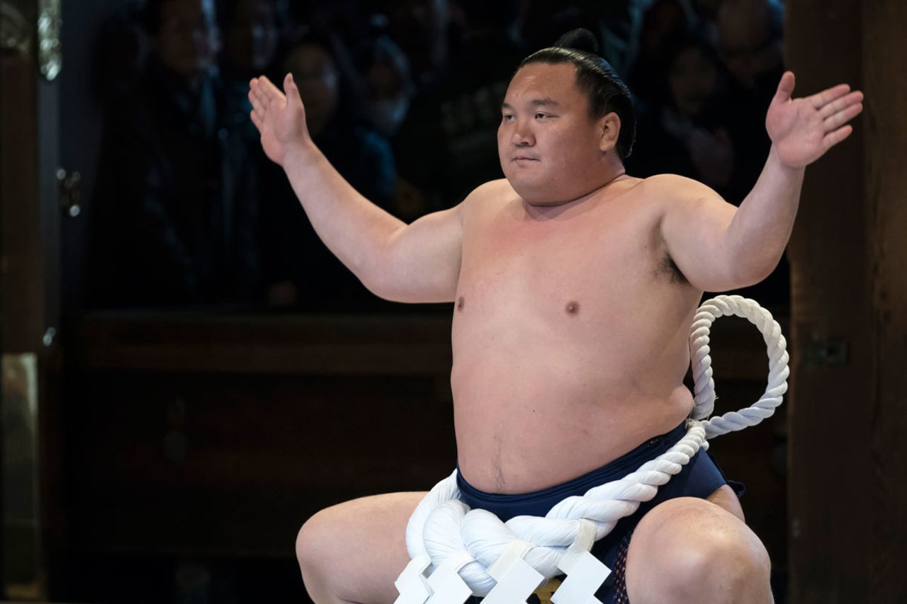 Mongolian-born grand sumo champion Sho Hakuho performs a kata during a ring-entering ceremony at the Meiji Jingu Shrine on January 7, 2020 in Tokyo, Japan.