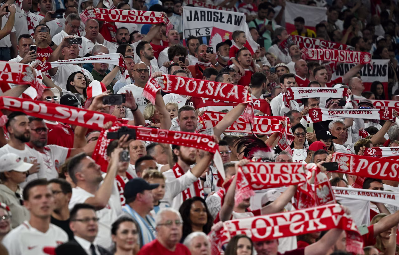 Poland fans show their support before the match.