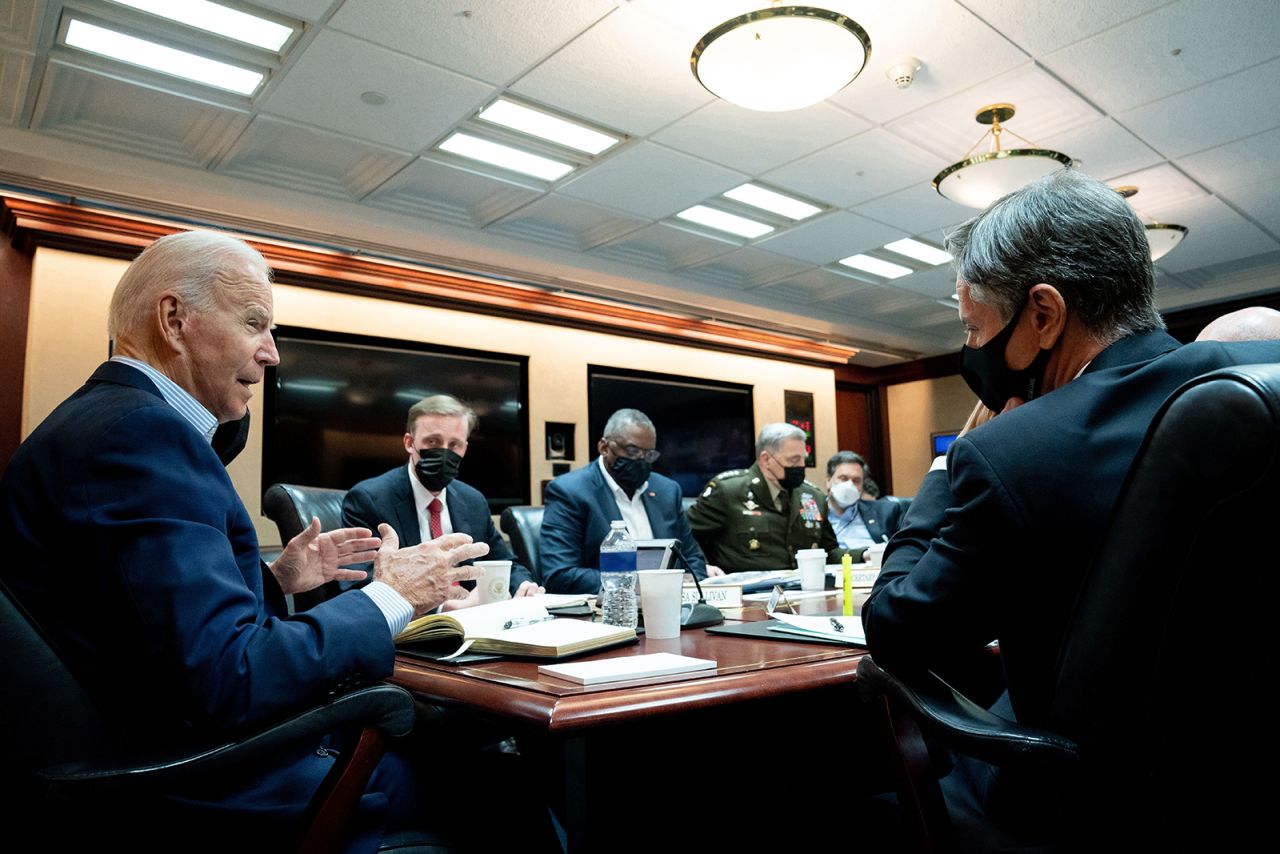 In this handout photo provided by the White House, President Joe Biden meets with his national security team for an operational update on the situation in Afghanistan on August 22 at the White House in Washington. They discussed the security situation in Afghanistan and counterterrorism operations, including ISIS-K.?