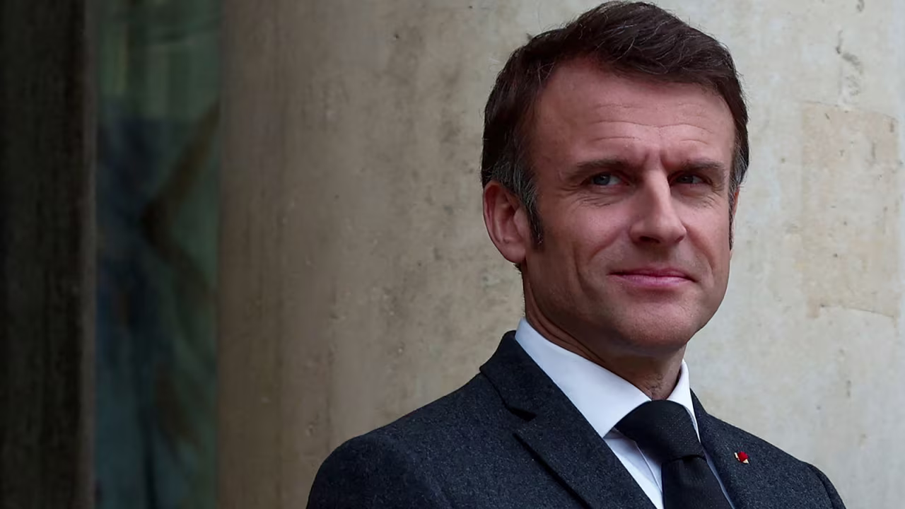 French President Emmanuel Macron stands at the entrance to the Elysee Palace in Paris, France, on March 11.