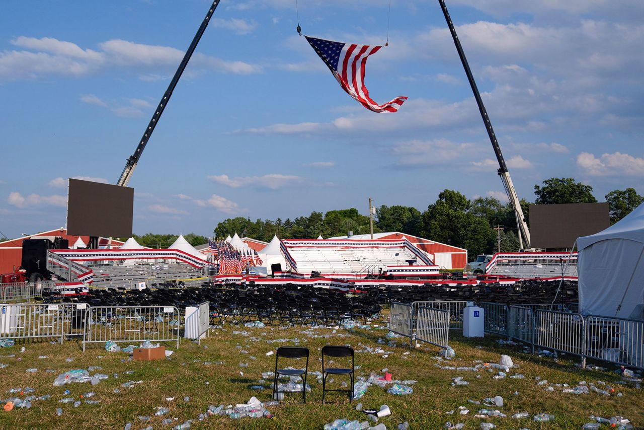 A campaign rally site for Republican presidential candidate former President Donald Trump is empty and littered with debris, in Butler, Pennsylvania on July 13.