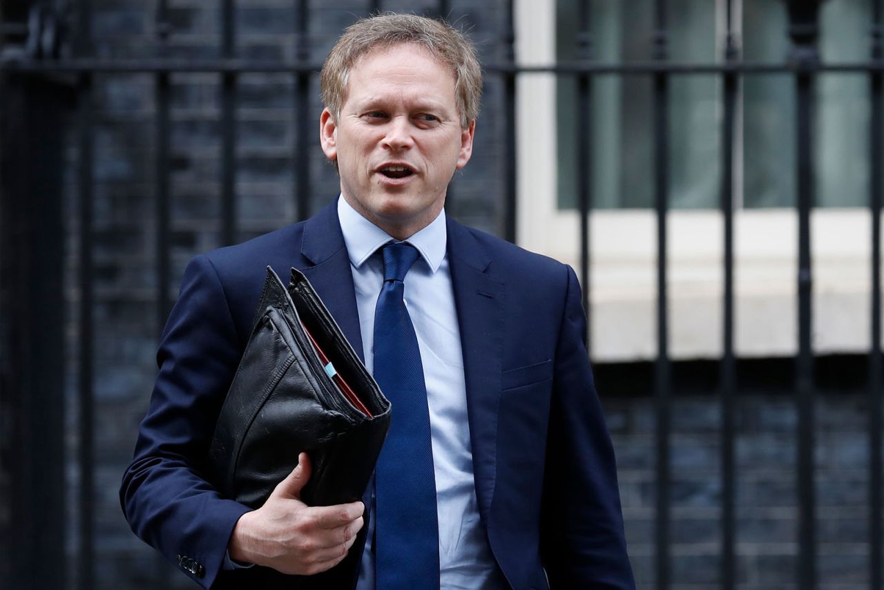 Britain's Transport Secretary Grant Shapps leaves number 10, Downing Street in central London on March 17.