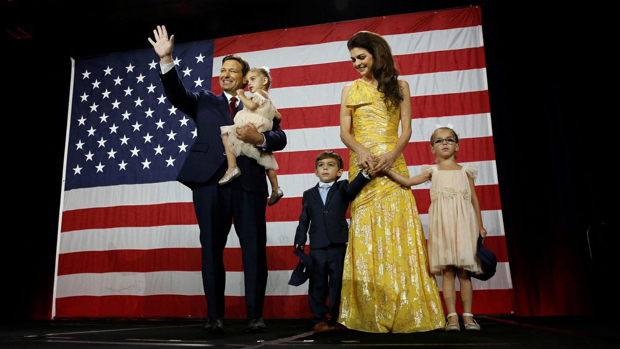 DeSantis on stage with his wife, Casey, and their three children.