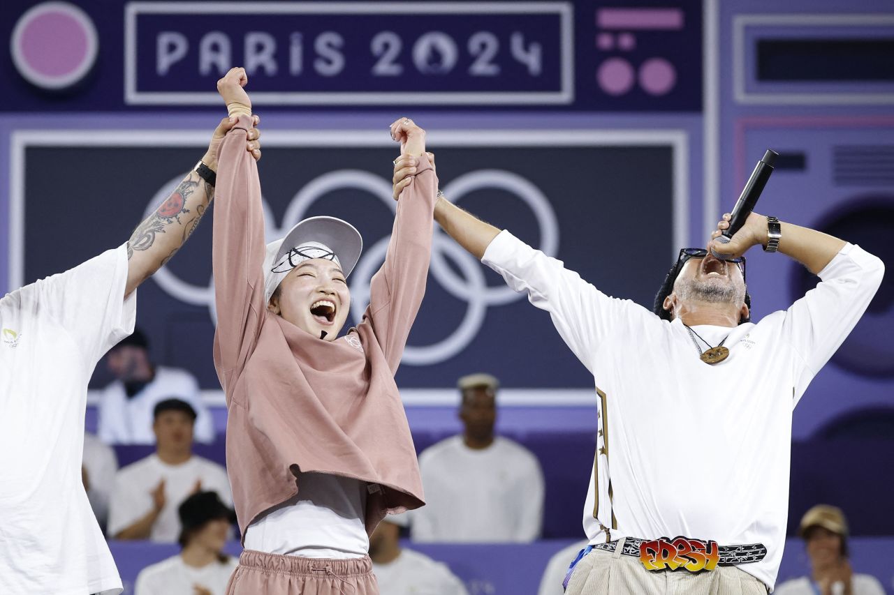 Japan's Ami Yuasa, known as B-Girl Ami, celebrates winning the first ever breaking gold medal Friday. 