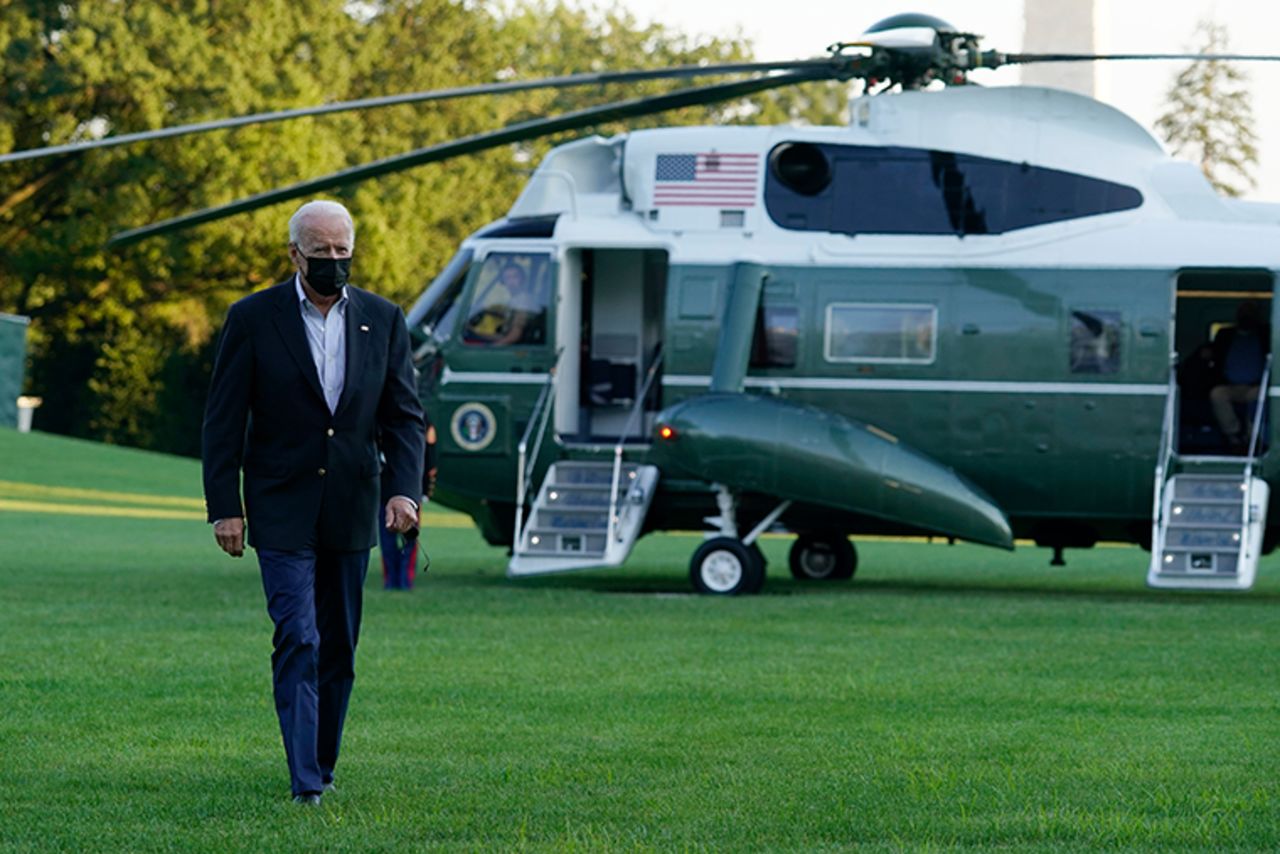 President Joe Biden walks across the South Lawn of the White House in Washington, Tuesday, Sept. 7, 2021.