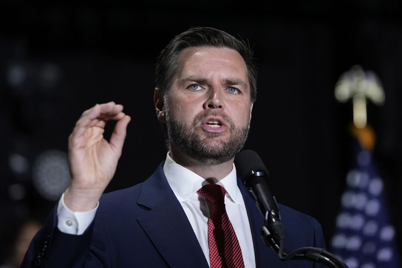 Republican vice presidential candidate Sen. JD Vance speaks with reporters at a news conference on August 6, in Philadelphia.