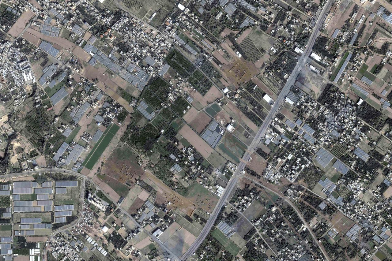 In this satellite image Israeli armored vehicles and tanks can be seen just north of Khan Younis, Gaza, on December 3.