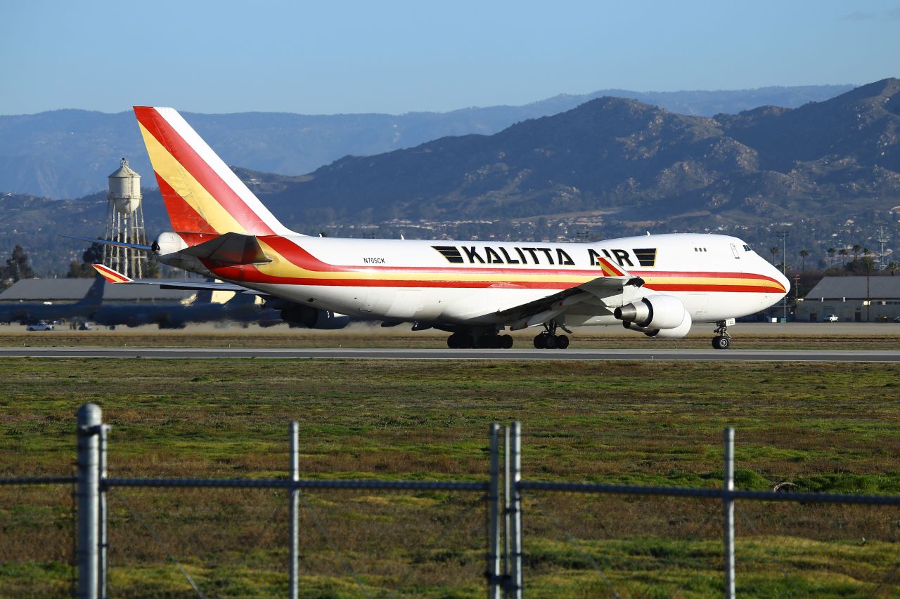A plane carrying evacuated US citizens from Wuhan lands at March Air Reserve Base in California on January 29, 2020.