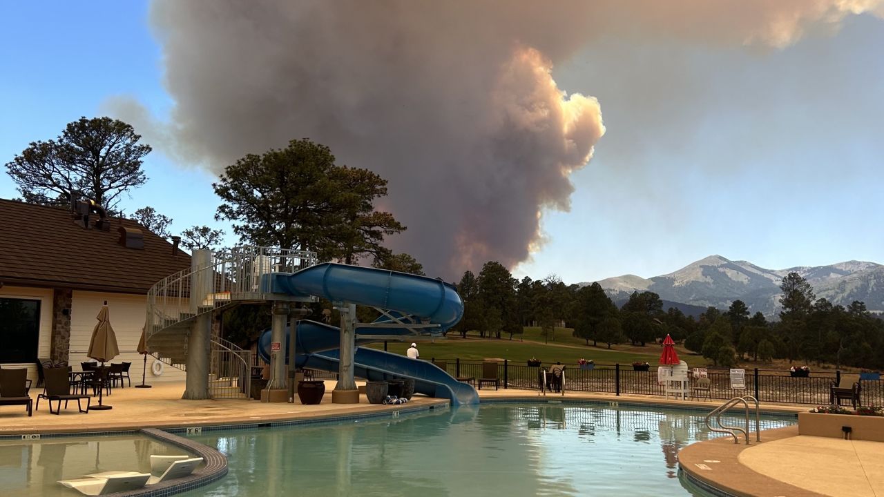 Kay Bymark said she noticed a “huge, billowing gray cloud” above her country club’s pool on Monday.