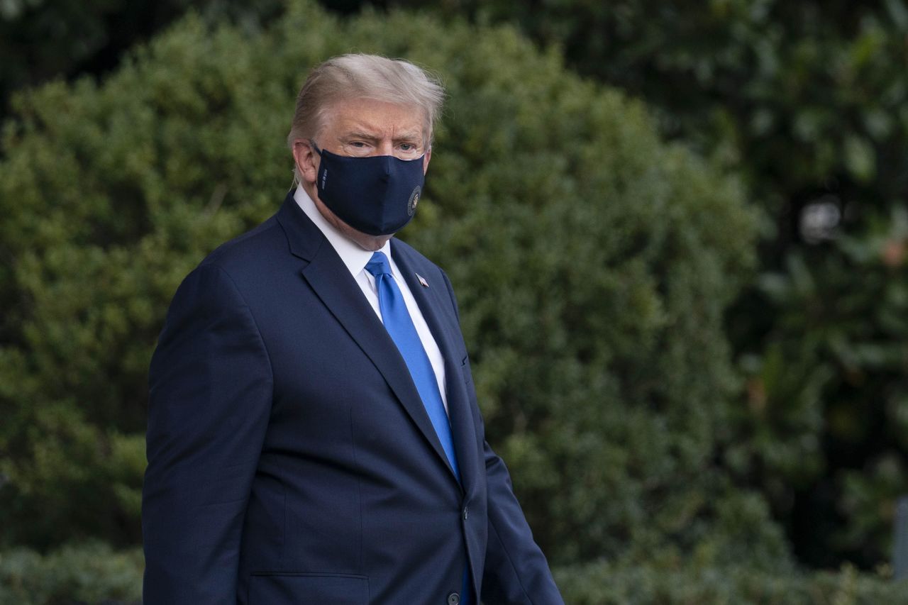 President Donald Trump walks to Marine One on October 2, to be taken from the White House to Walter Reed medical center in Bethesda, Maryland.