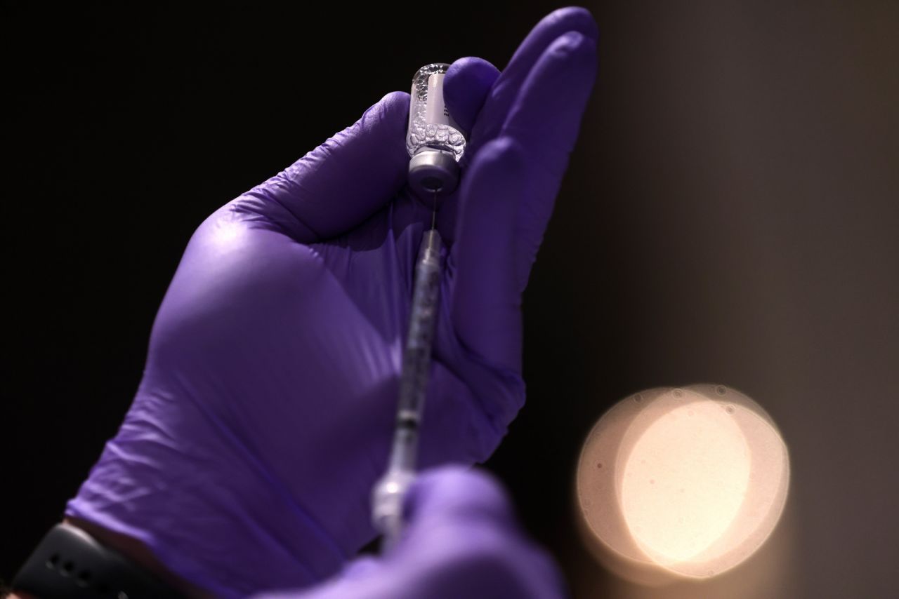 A medical worker draws COVID-19 vaccine from its vial during a public vaccination event at Washington National Cathedral on March 16 in Washington, DC. 