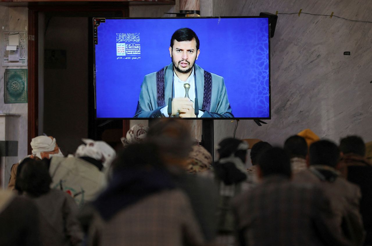 Newly recruited Houthi fighters watch a recorded message from Houthi leader Abdul Malik al-Houthi in Sanaa, Yemen, on January 11. 