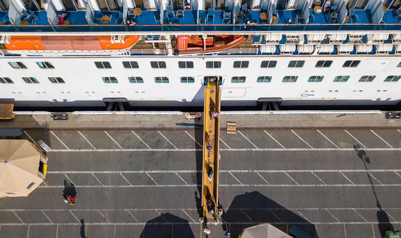 Passengers disembark from the Grand Princess cruise ship in Oakland, California on March 10.