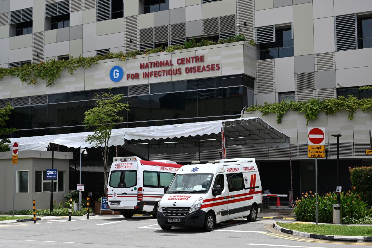 Ambulances are seen at the National Center for Infectious Diseases, where coronavirus patients are being treated, in Singapore on April 3.