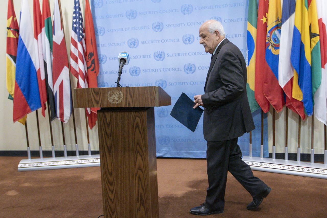 Ambassador Riyad Mansour, Permanent Observer of the State of Palestine to the United Nations, arrives to speak to reporters during a press conference before the UN Security Council meeting on Sunday.