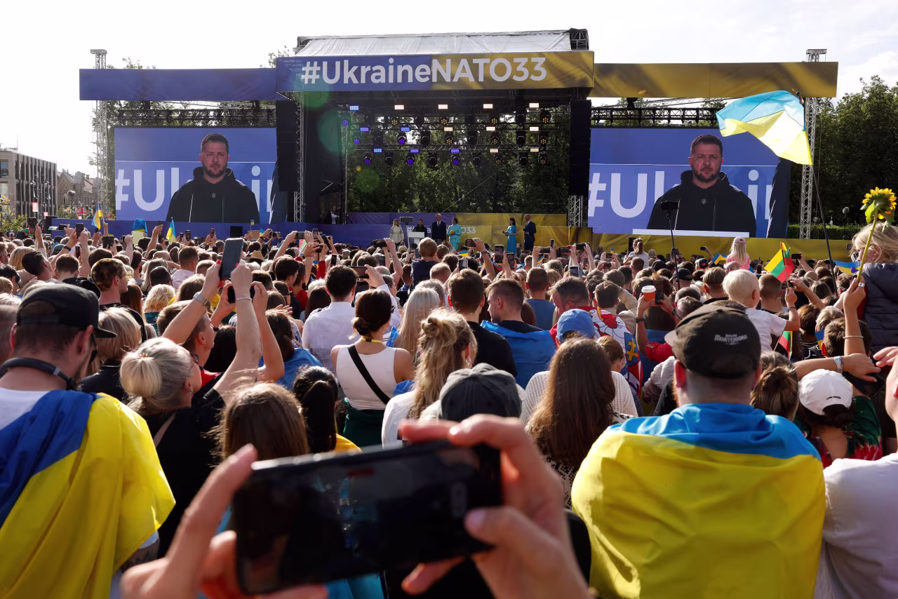 Ukrainian President Volodymyr Zelensky addresses the crowd at Lukiskiu Square in Vilnius, Lithuania, on Tuesday.