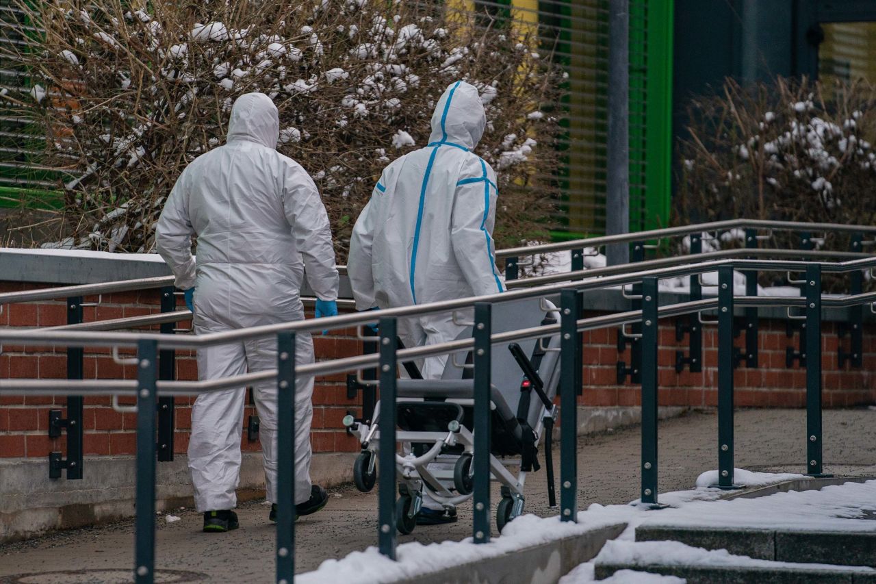 Medical staff walk towards the main entrance of a hospital in Bayreuth, Germany, on January 26.