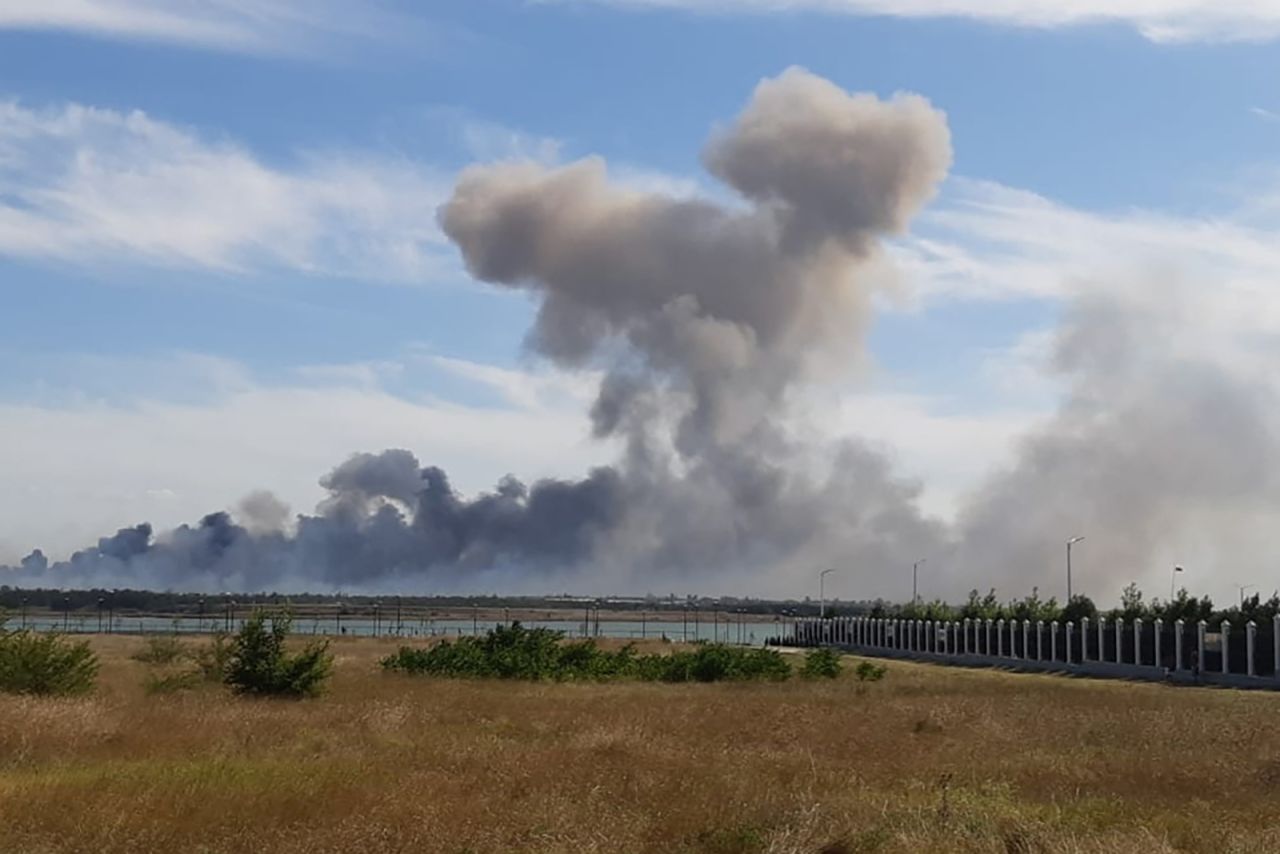 Smoke rises after explosions were heard from the direction of a Russian military airbase near?Novofedorivka, Crimea on August 9.