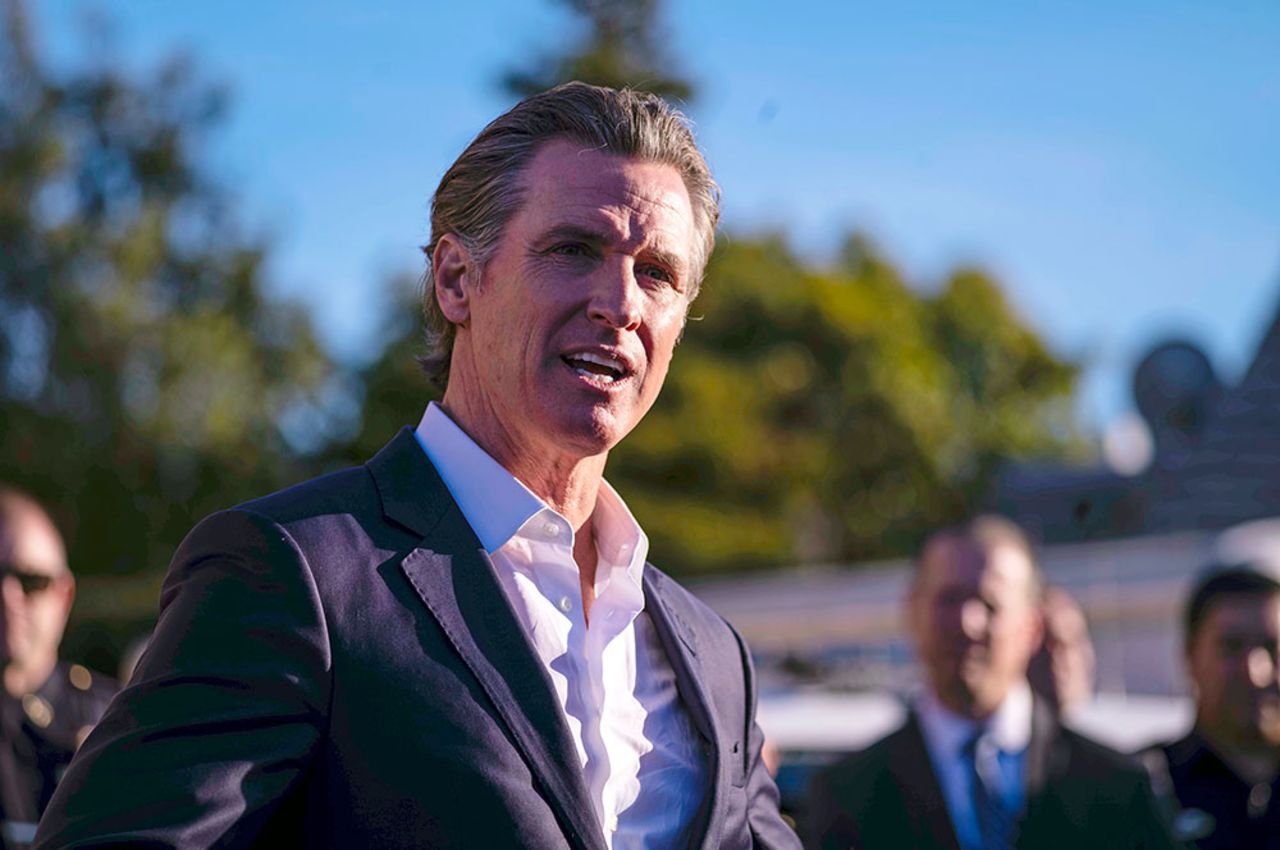 Gov. Gavin Newsom speaks Tuesday, January 24, at the I.D.E.S. Portuguese Hall in Half Moon Bay, California. (