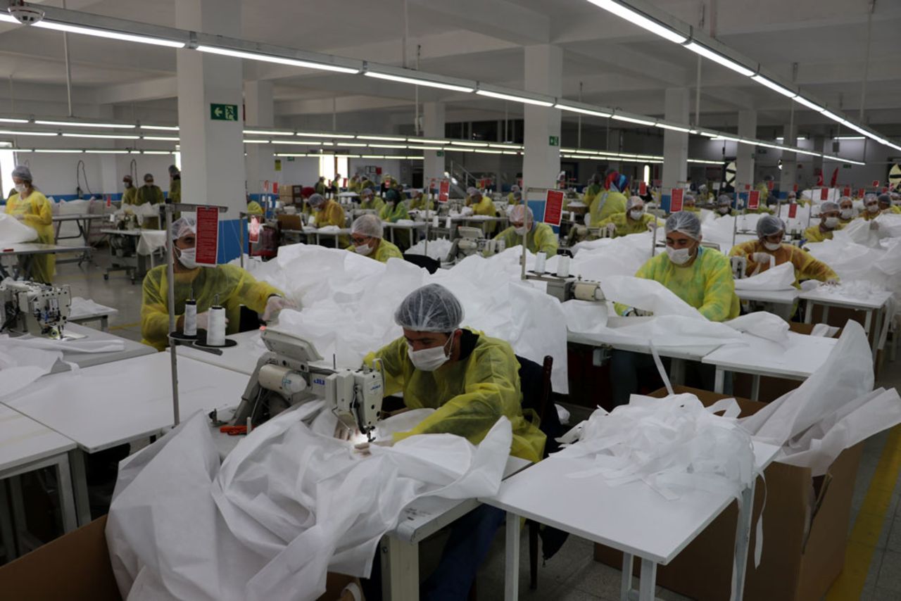 Workers produce disposable surgical gowns and masks to be used against the coronavirus in Mersin, Turkey, on April 18.