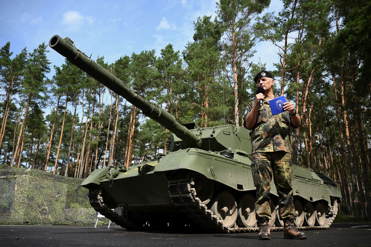 German Lieutenant General Andreas Marlow stands in front of a Leopard 1A5 battle tank as he speaks to the press in Klietz, Germany, on Thursday.