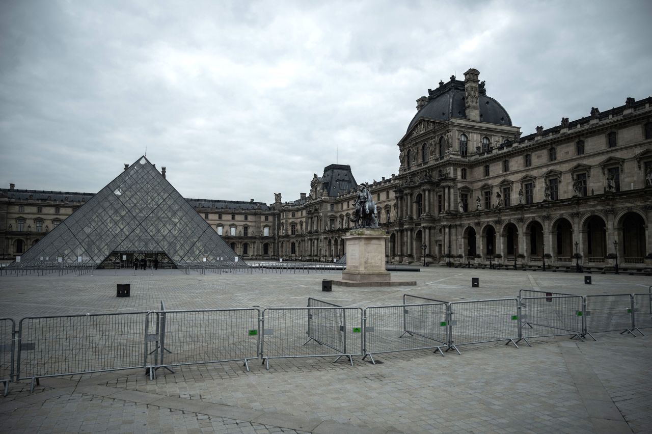 The square in front of the pyramid of the Louvre Museum in Paris is empty on March 18.