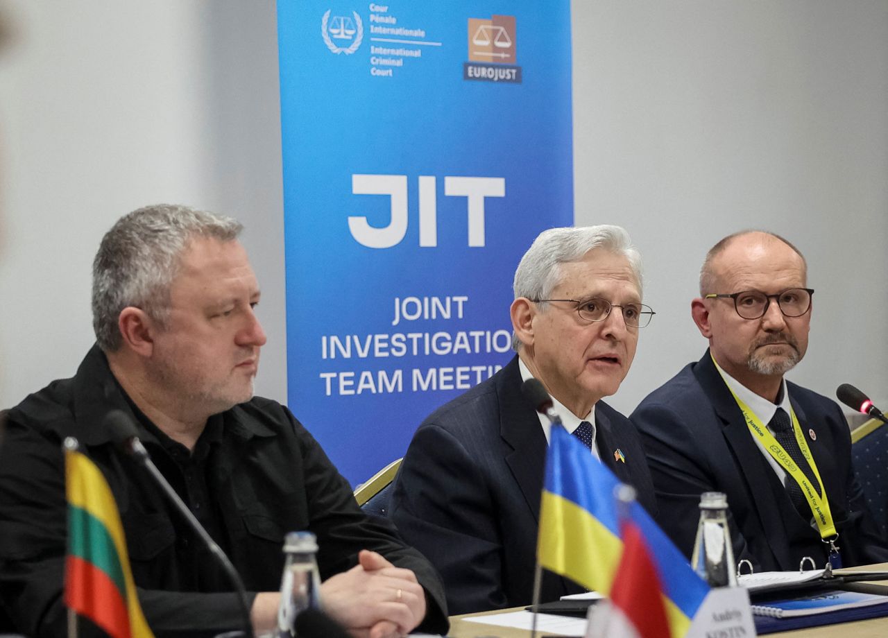 Left to right: Ukrainian Prosecutor General Andriy Kostin, US Attorney General Merrick Garland, and National Prosecutor of Poland Dariusz Barski meet in Lviv, Ukraine, with a group of international prosecutors on Friday.