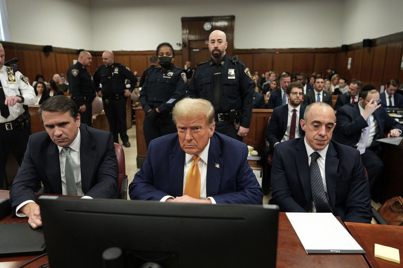 Former President Donald Trump sits next to his lawyers Todd Blanche and Emil Bove as he arrives for his trial at Manhattan Criminal Court on May 14 in New York. 