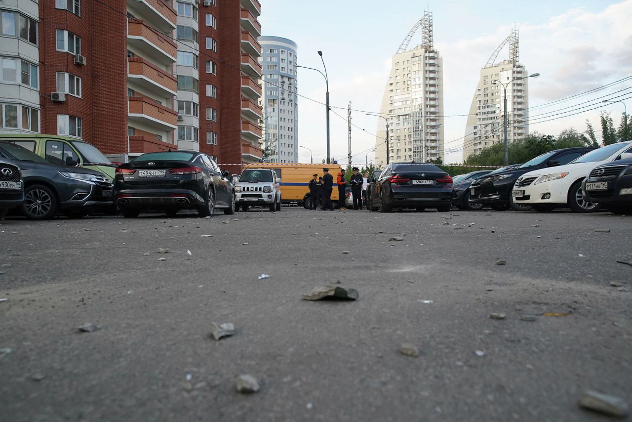 Law enforcement officers work at the site of a drone attack in Krasnogorsk, in the Moscow region, Russia, on August 22.