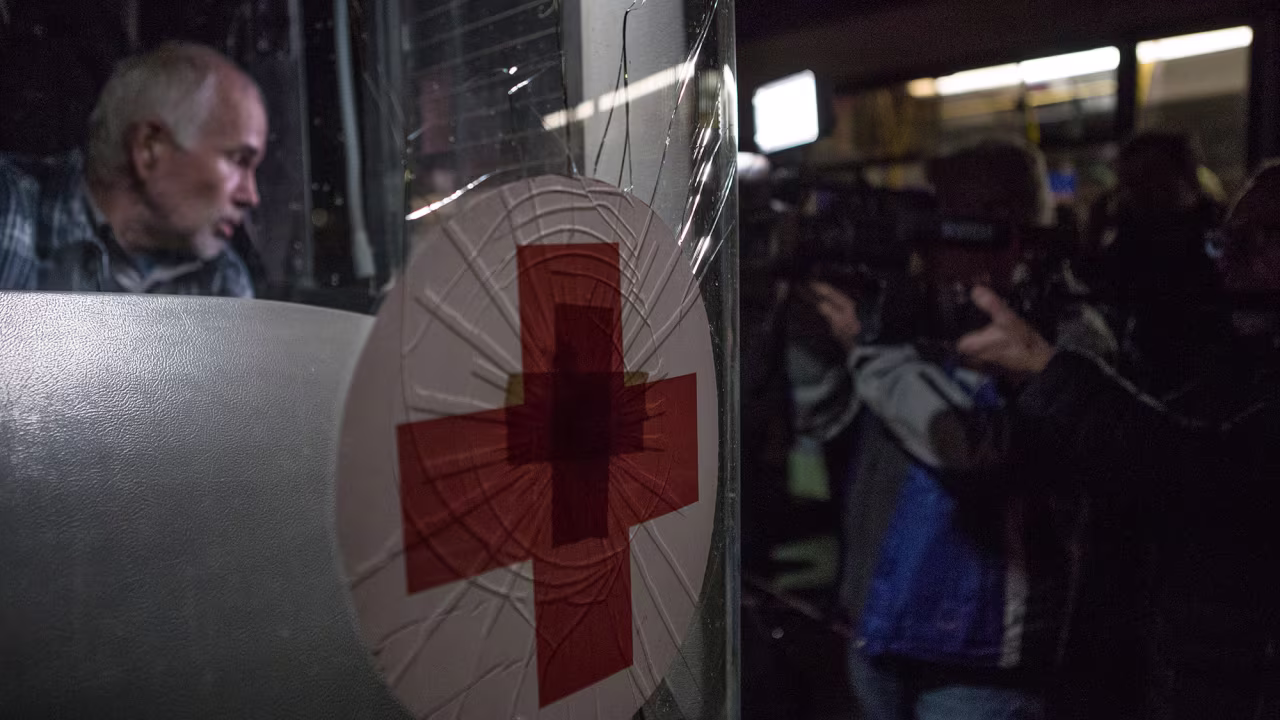 A humanitarian convoy of 42 buses from Mariupol arrives at a refugee center in Zaporizhzhia, Ukraine on April 1.
