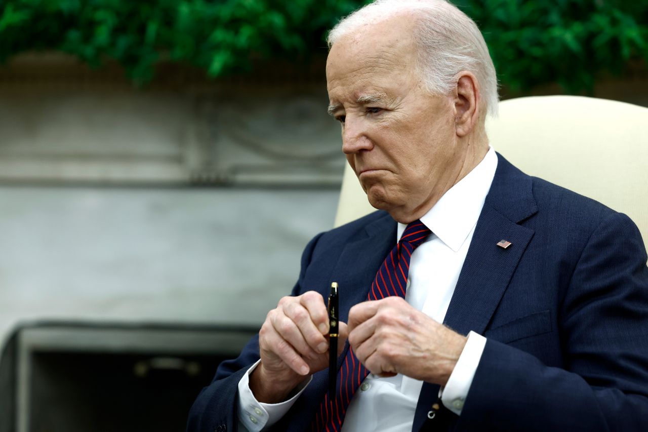 Joe Biden listens in the Oval Office of the White House in Washington, DC, on April 15.